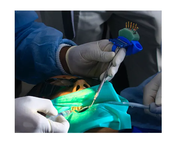 Rubber dam placed around a tooth during treatment